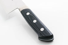 Load image into Gallery viewer, A close-up of the durable handle of the SWORD FV10 Gyuto, showing the three stainless steel rivets, the texture of the black laminated wood, and the polished bolster.