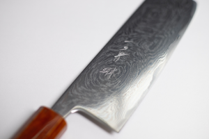 A luruxious stainless steel Japanese knife for cutting and slicing vegetables.