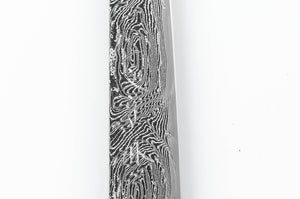 A damascus pattern on a stainless steel Japanese knife that is easy to see