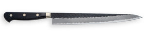 Japanese Sujihiki Slicing Knife with a Tsuchime hammered finish and a triple-rivet black pakkawood handle.