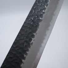 Load image into Gallery viewer, Sakai Ichimonji Mitsuhide, KURO Kiritsuke-Gyuto Japanese knife, made in Japan, Kurouchi finish close-up, Blue Super Steel blade texture
