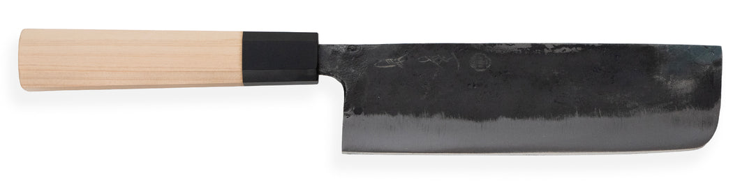 YOI Series Nakiri knife, hand-forged in Japan with black kuro-uchi blade and octagonal magnolia handle.
