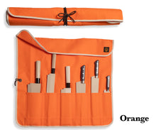Load image into Gallery viewer, An open orange canvas knife roll displaying six Japanese kitchen knives in their individual slots.
