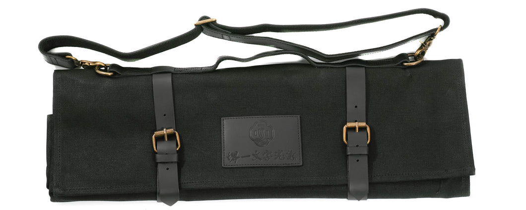 A black canvas roll designed to hold many kitchen knives.